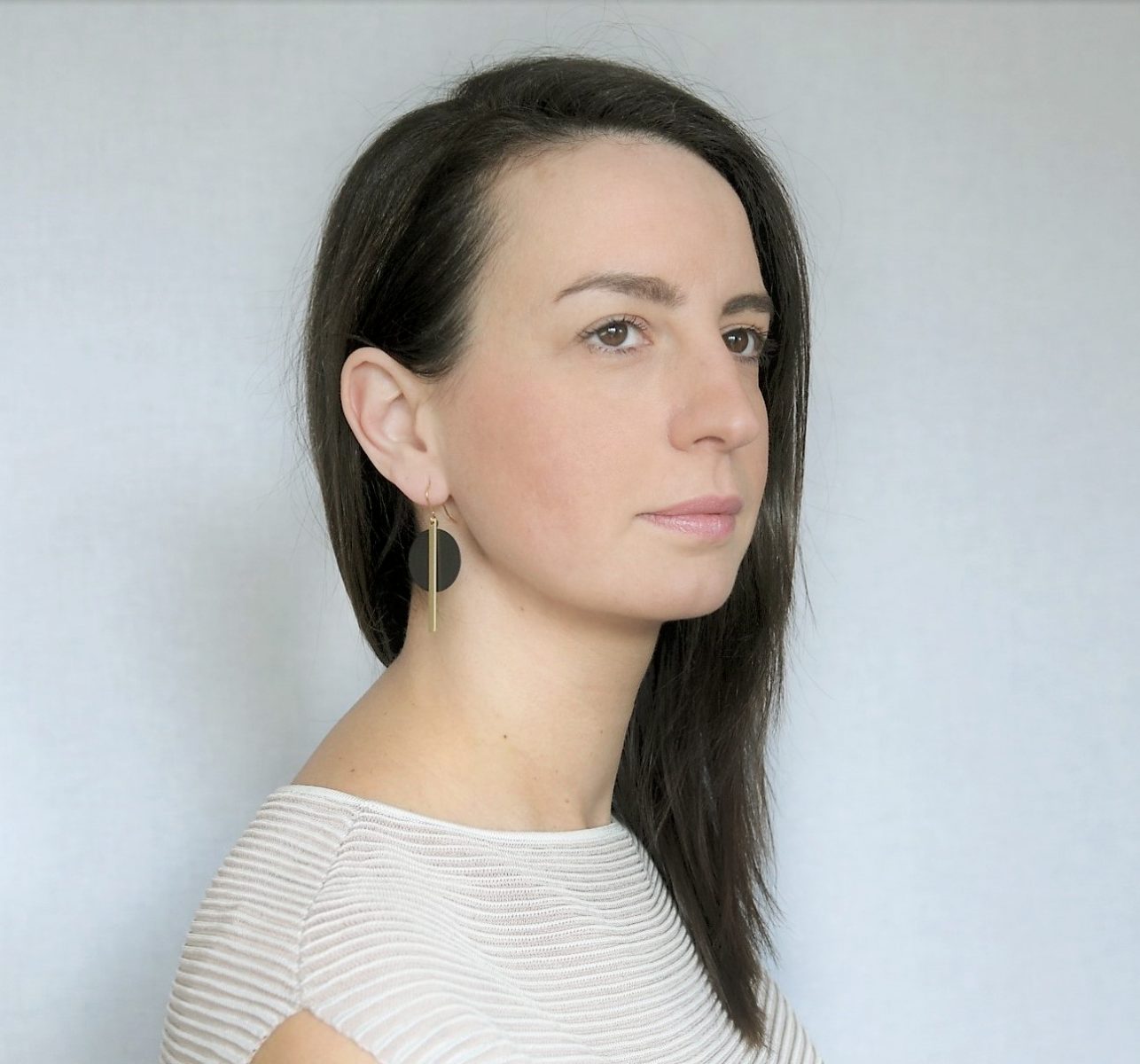 Black disc and brass bar earrings