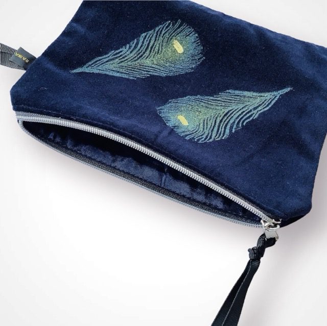 Luxury Navy Velvet Zip Up Pouch with blue Peacock Feathers hand printed design with golden shimmer and with Black Grosgrain hand strap