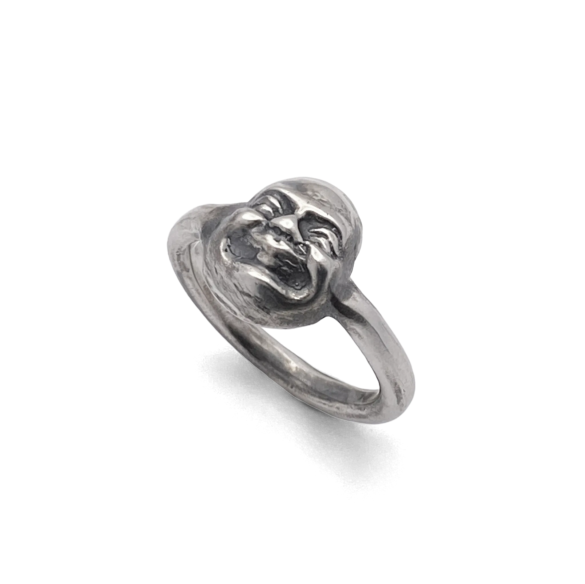 ngled view of Buddha Face Ring showing band and face detail