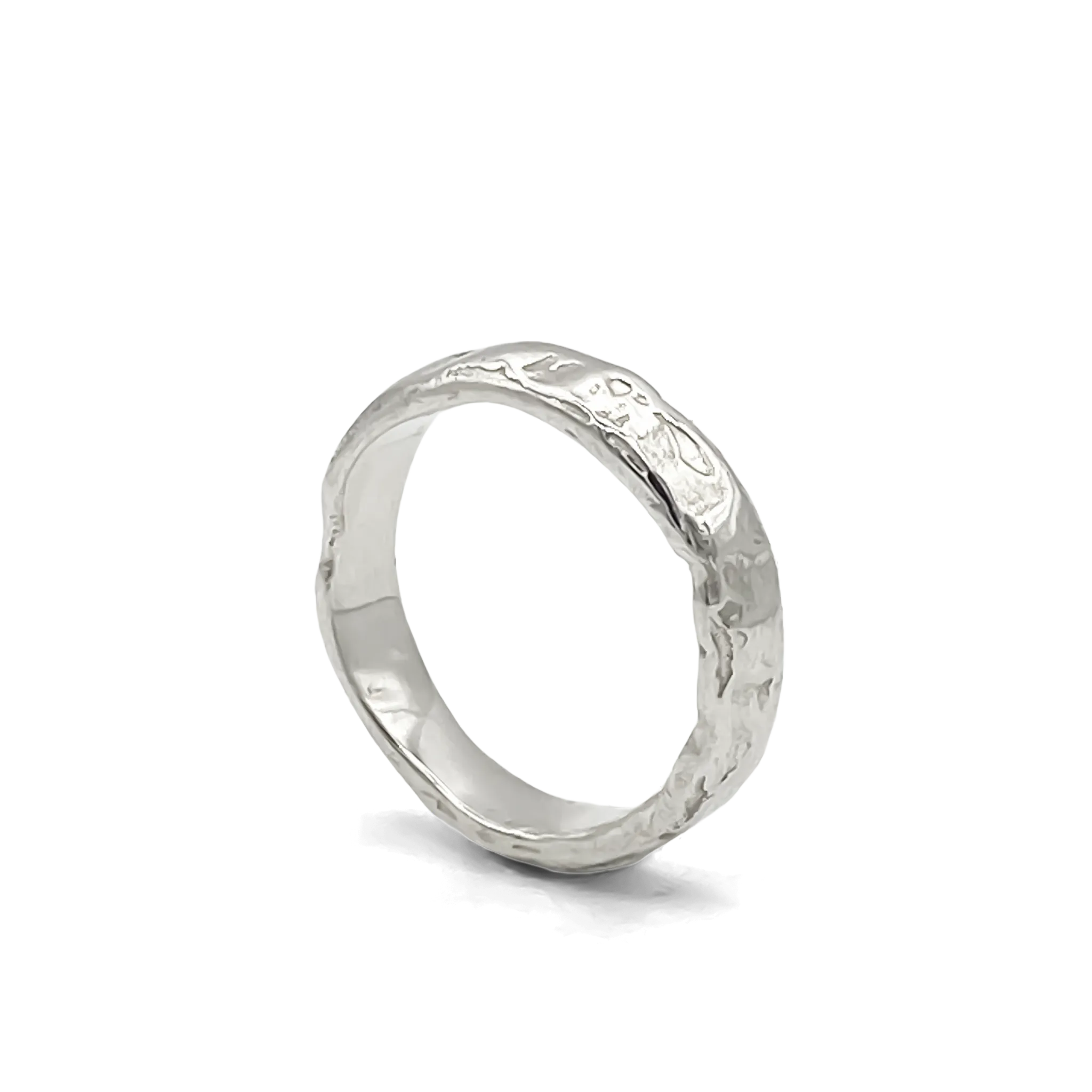 Textured silver band ring on a white background