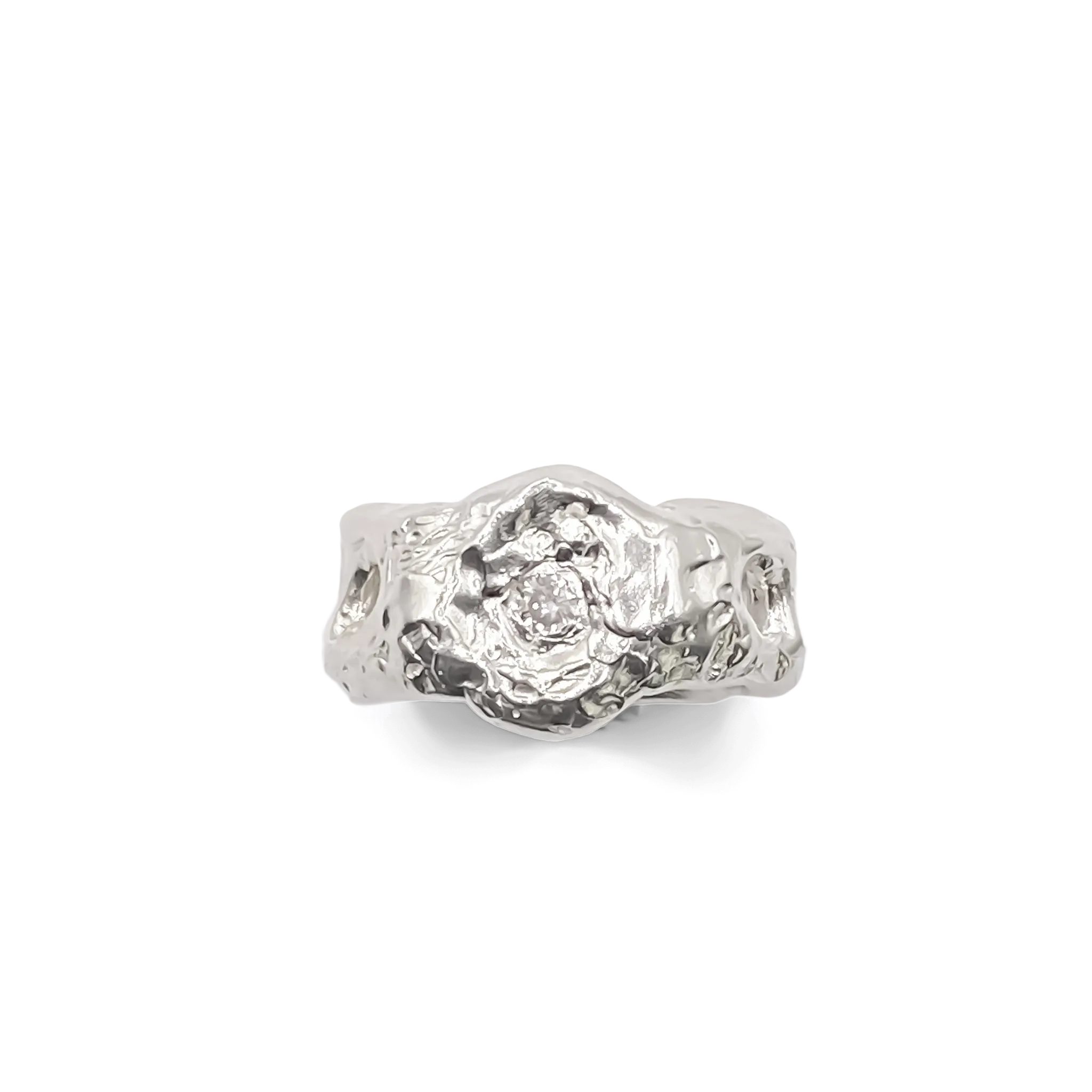 Sterling silver ring with organic cutouts and central gemstone