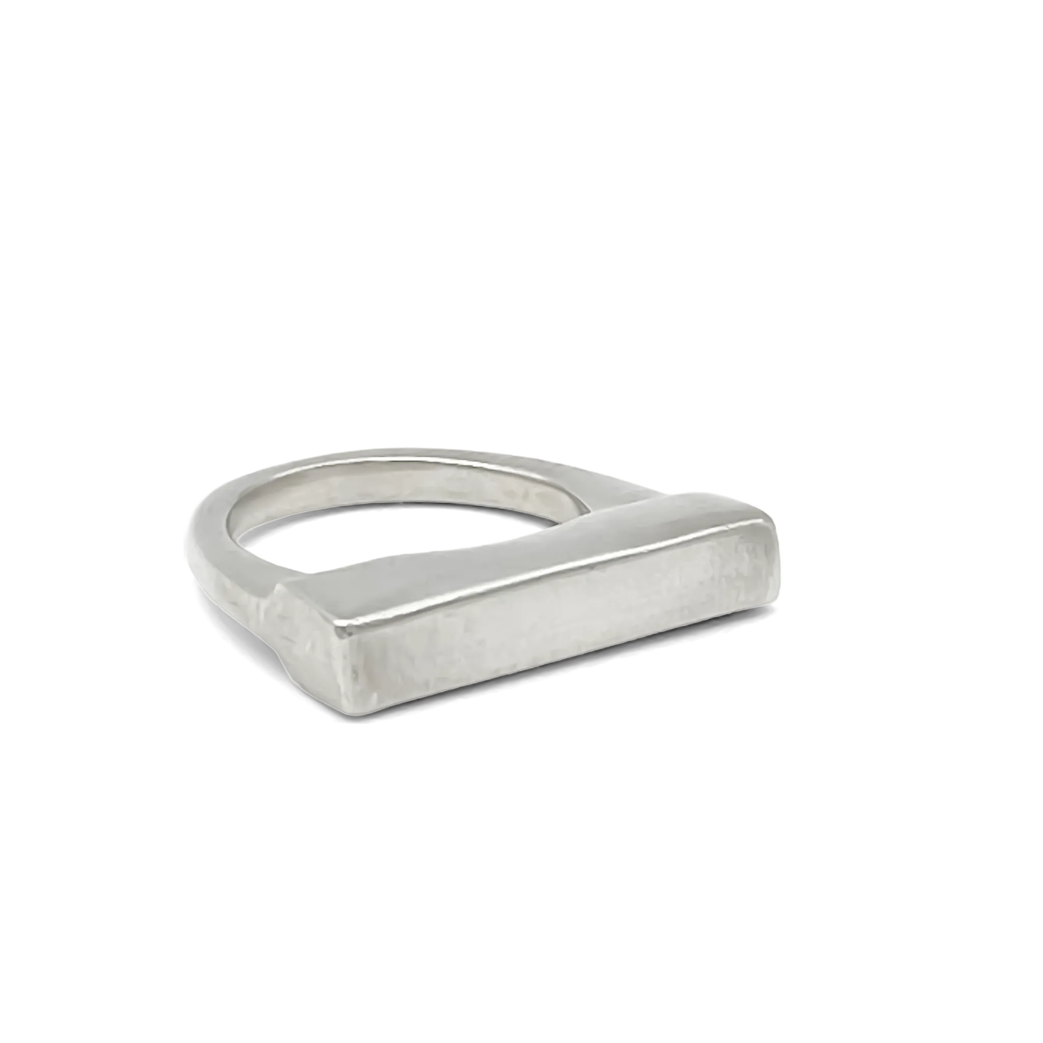 Flat ring lying flat, top view of band and face
