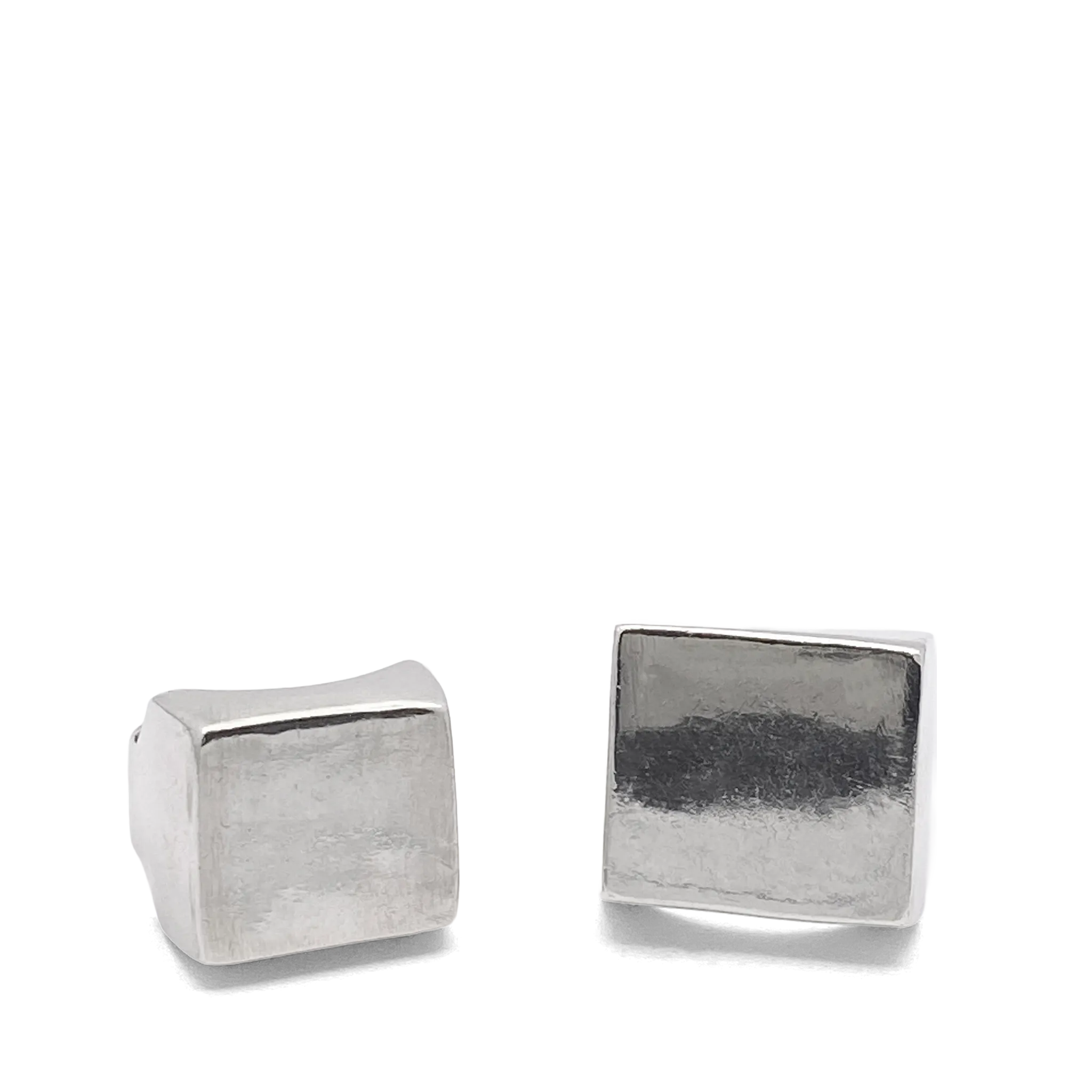 Two handcrafted sterling silver square signet rings displayed on a white background