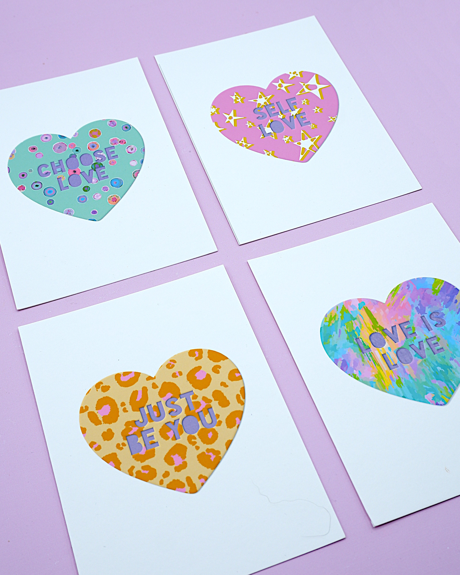 Selection of 4 mini art prints each featuring 1 of 4 uplifting and LGBTQ inclusive phrases. Including Choose Love, Love is Love, Just Be You and Self Love