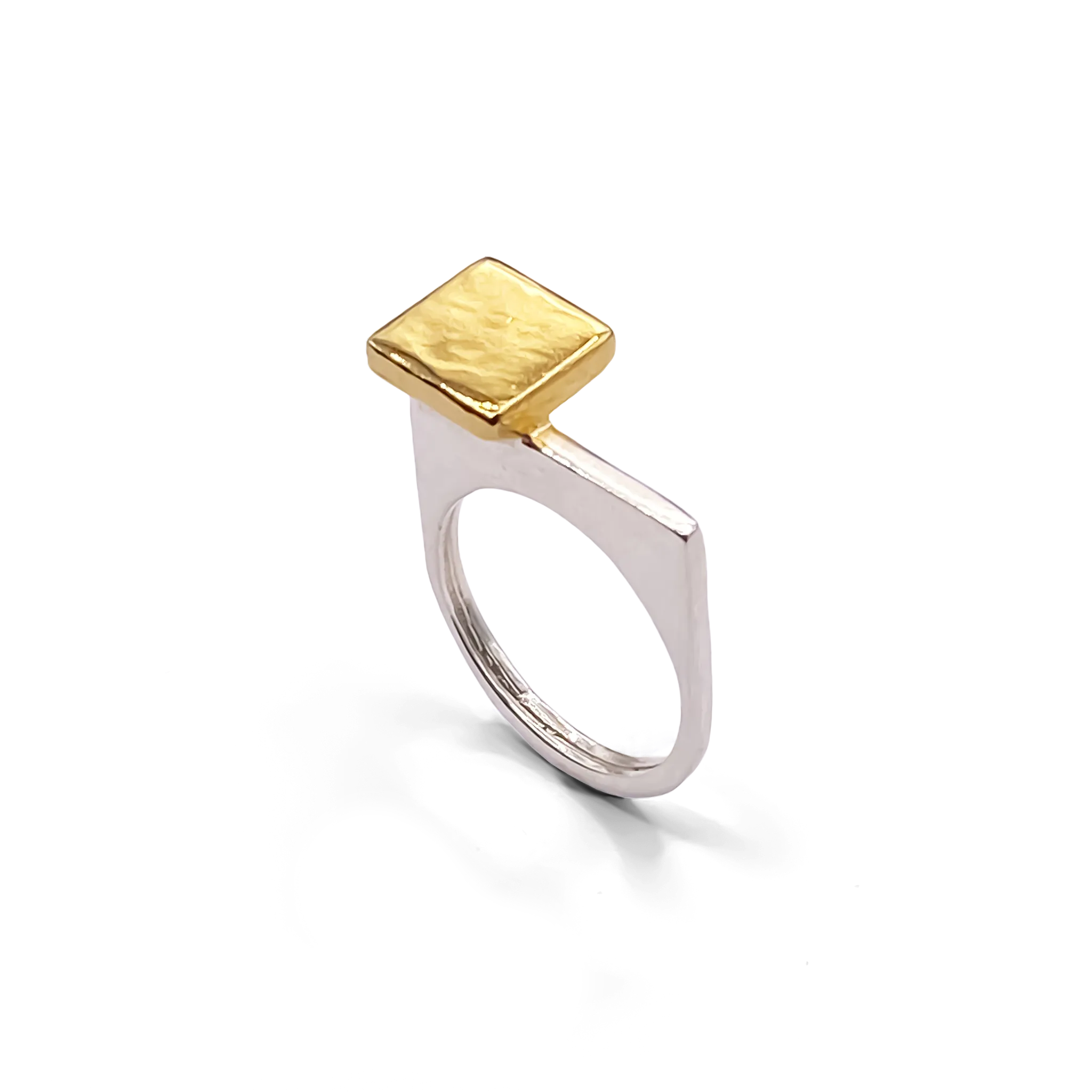 angled view of square-top signet ring with gold vermeil face
