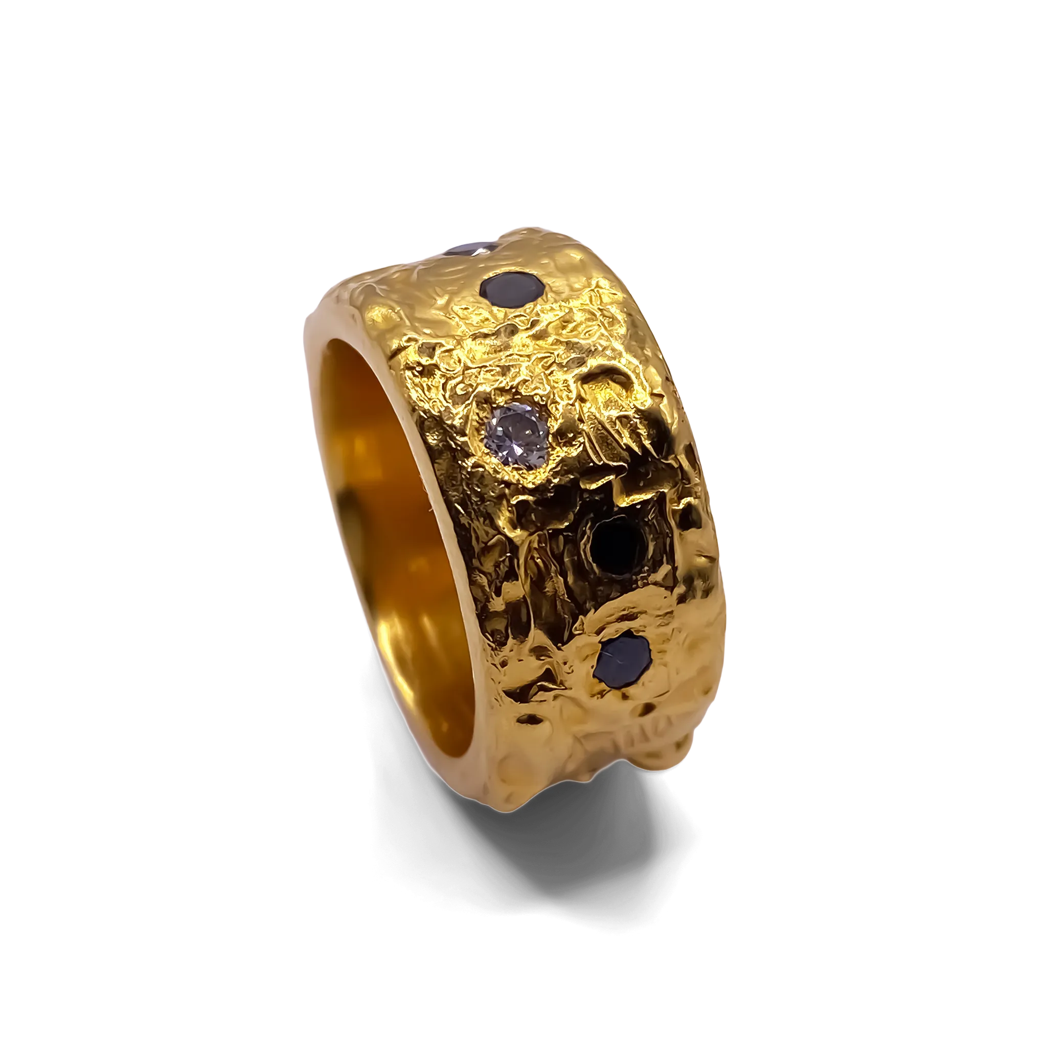 Angled view of gold vermeil ring with hammered texture and gemstone accents.