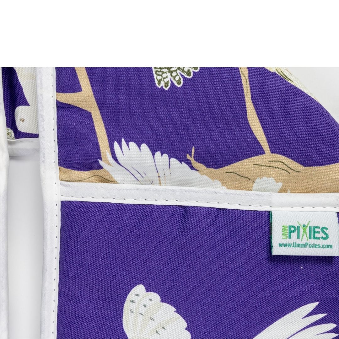 close up of UmmPixies brand label on Owl design oven gloves