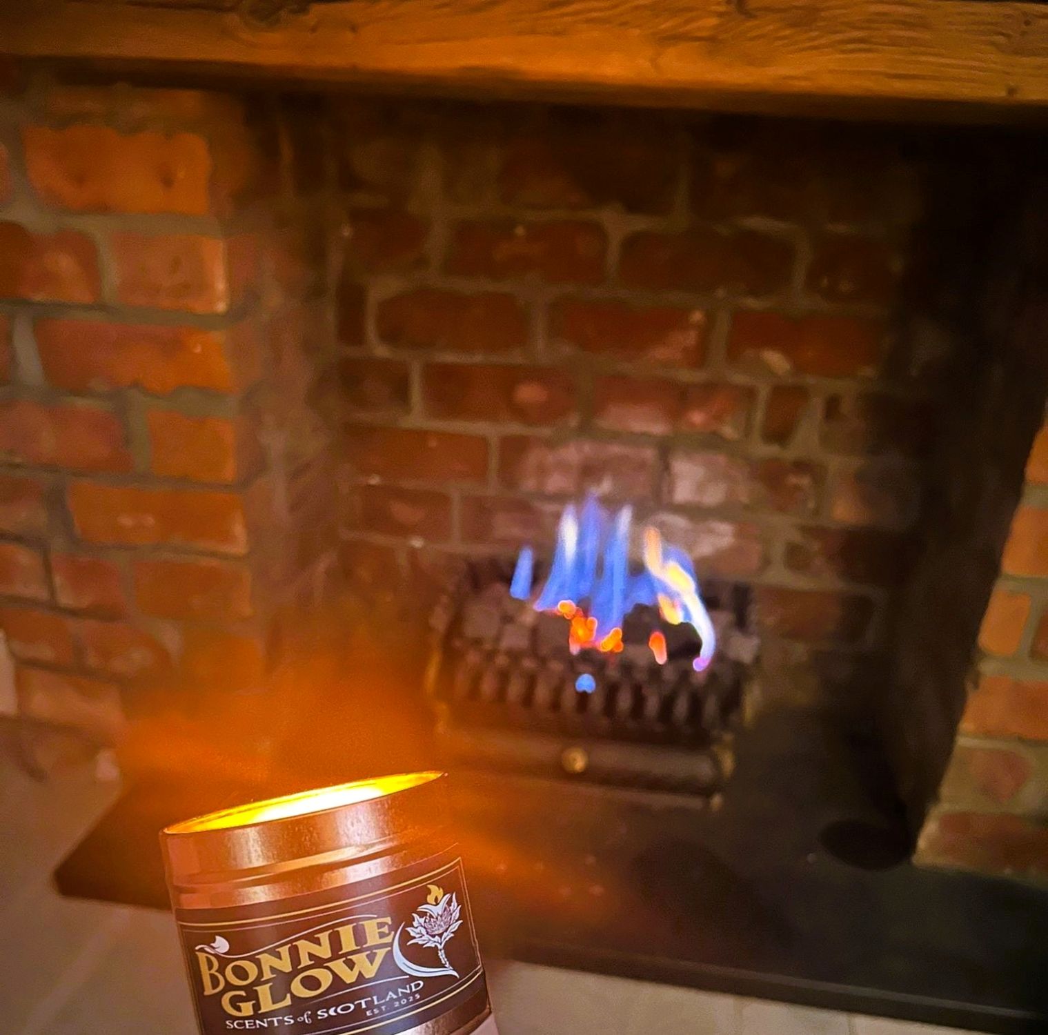 Bonnie Glow Lang May Yer Lum Reek candle - Scottish smoky fireplace scented candle with traditional blessing
