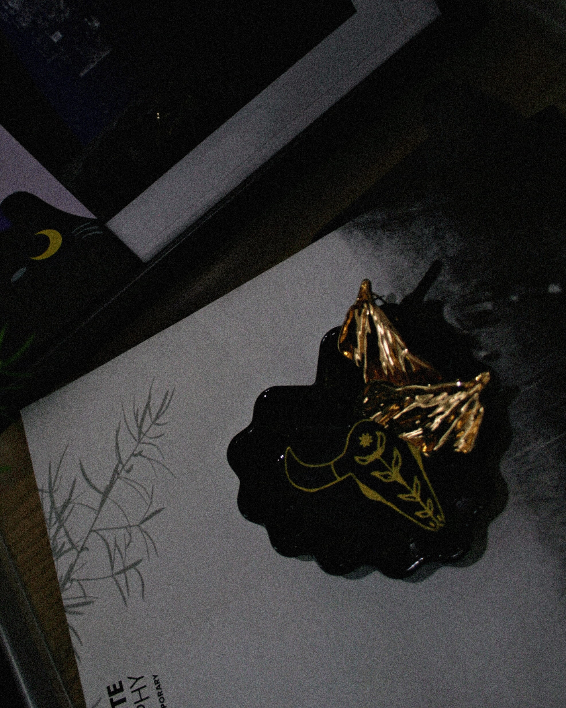 Heart shaped tray black with a cow skull painted on