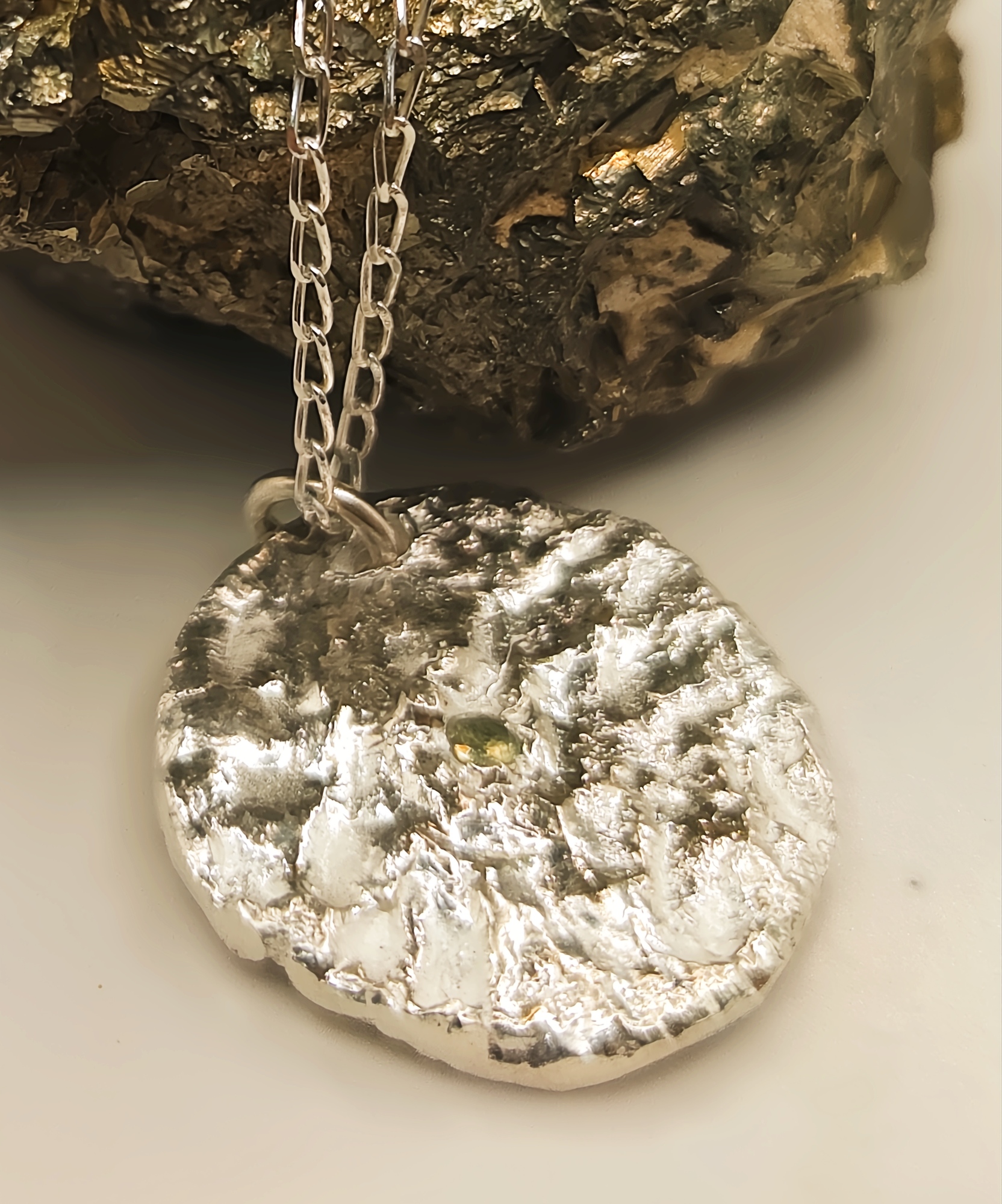 Reticulated Sterling Silver Pendant with Green Sapphire